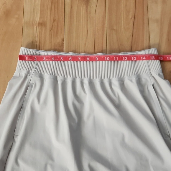 Athleta Cosmic hi-low knee - high beige skirt  size Medium - Picture 7 of 8